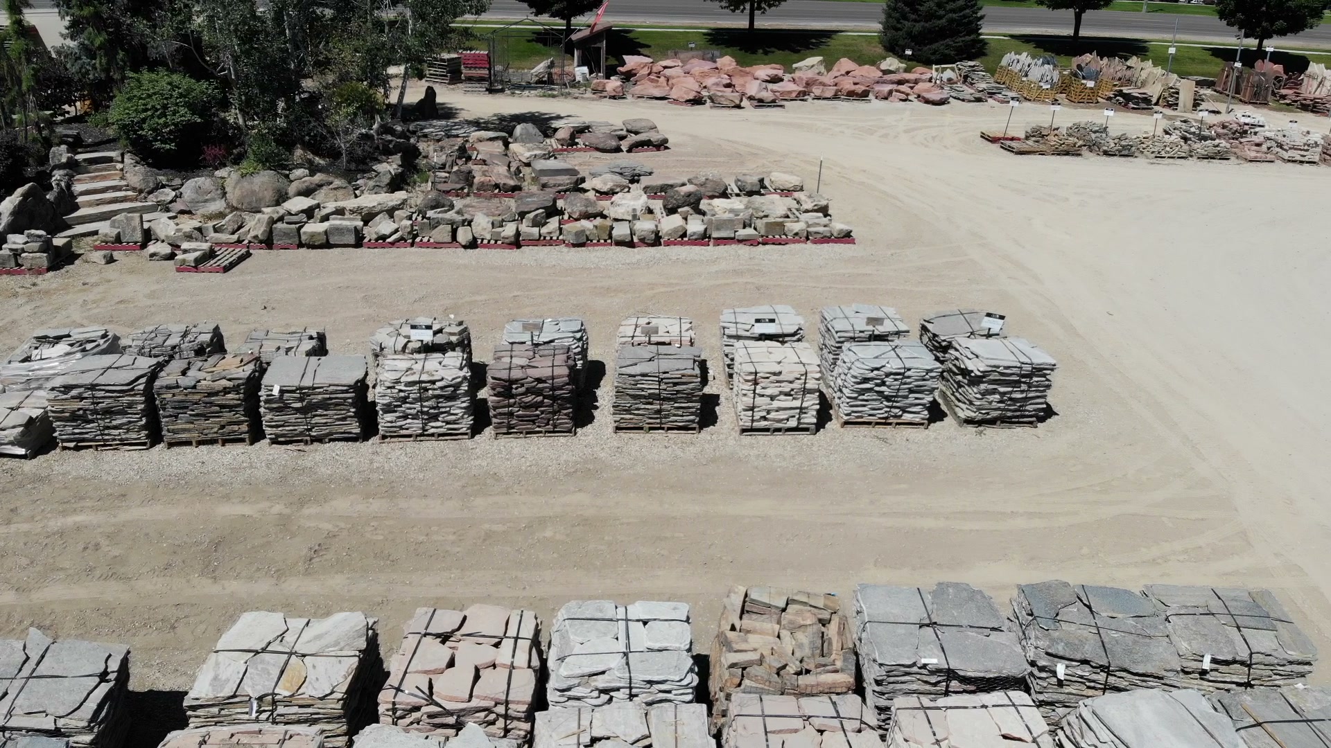 Pallets of flagstone and patio stone at a landscape supply yard